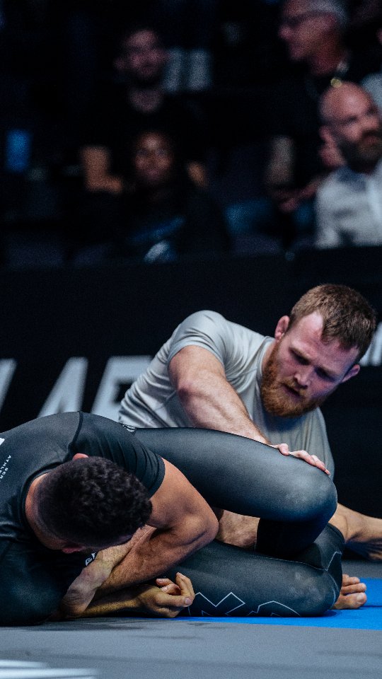Instagram post by @bjj.worldtv for Timex. Caption reads: that time when @langakerbjj TANKED a heel hook....