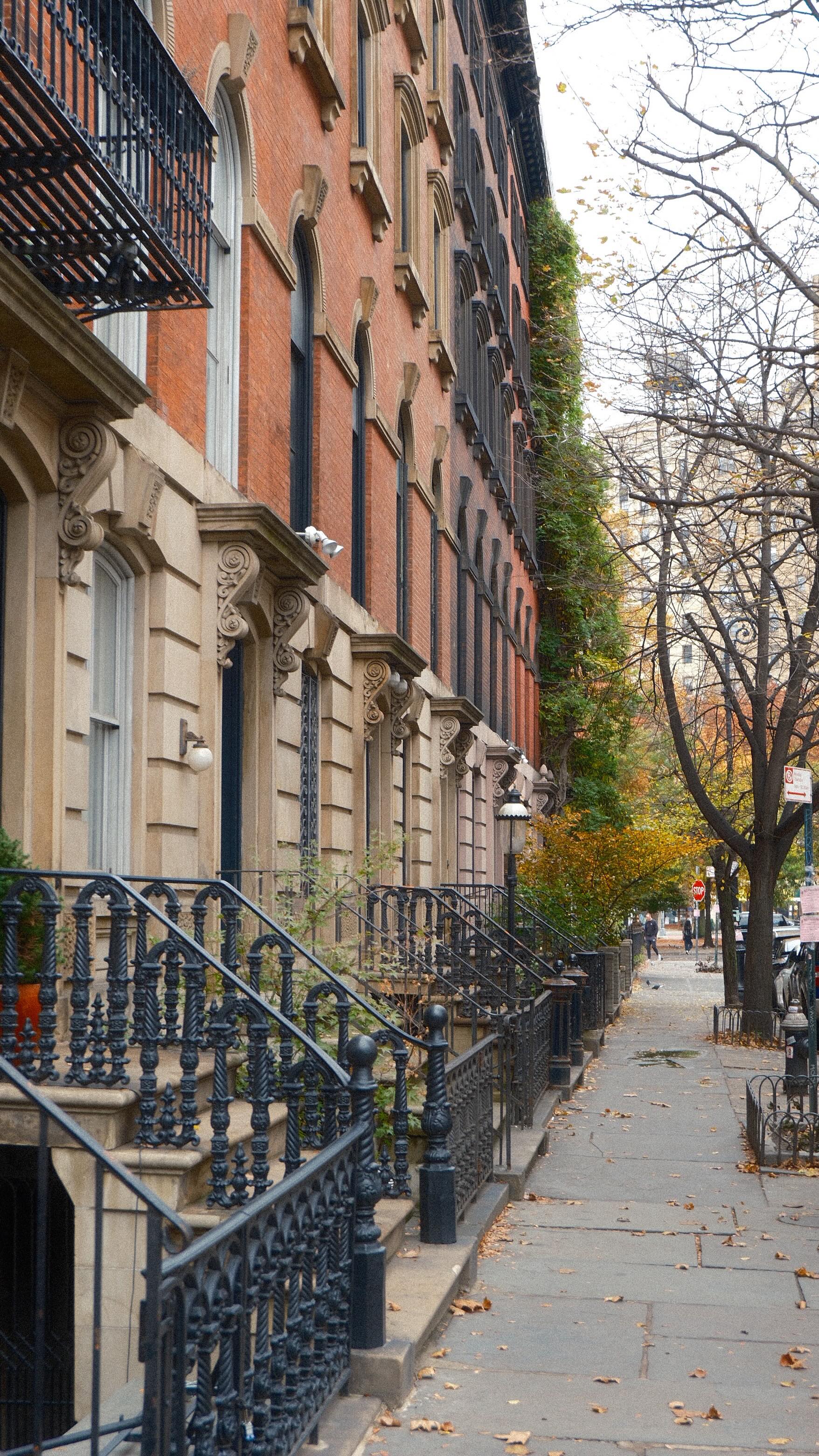 Instagram post by @katlinandsourabh for UNIQLO. Caption reads: Twinning with head to toe @uniqlo love the fall in....