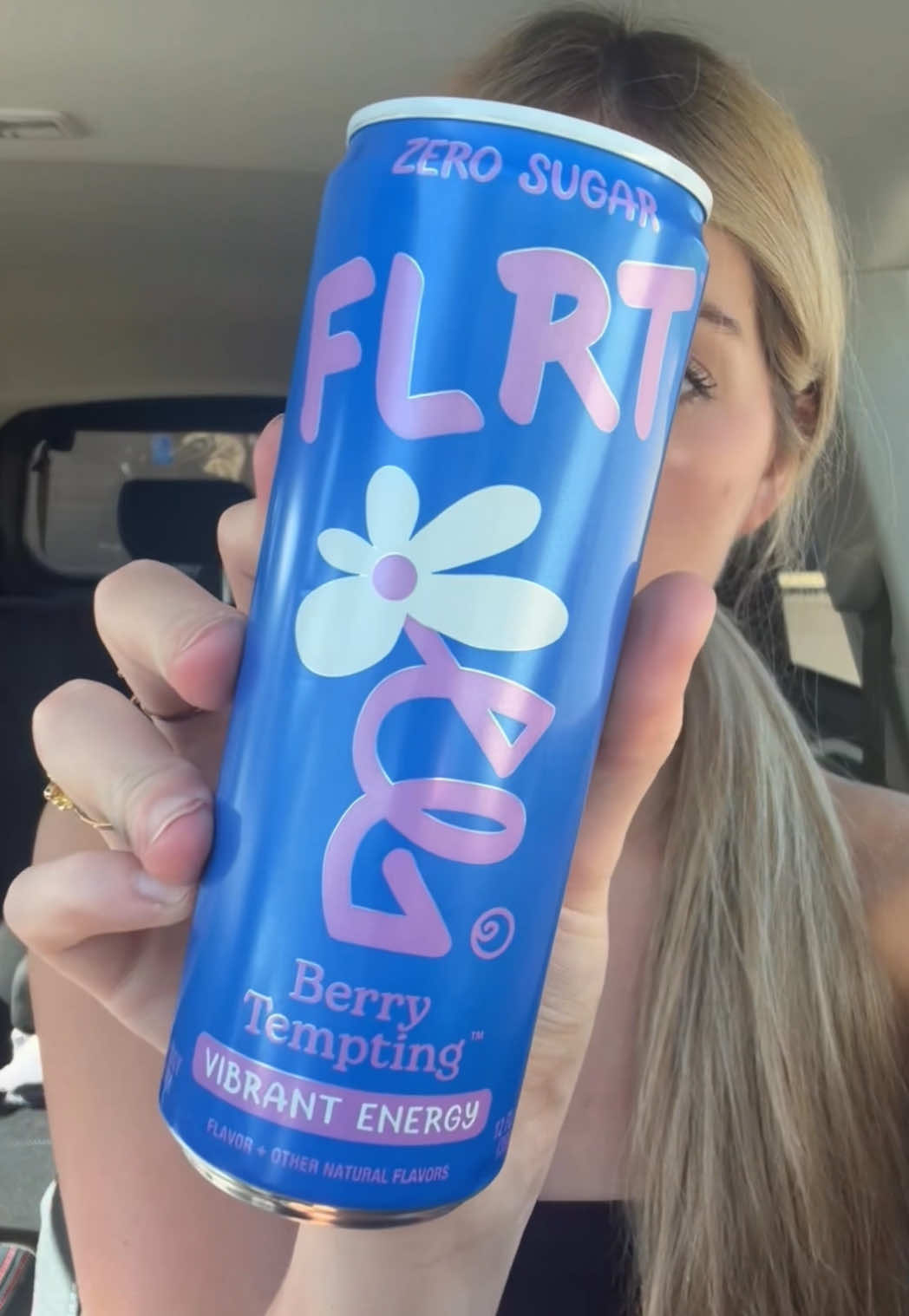 TikTok post by an influencer for FLRT. Caption reads: [...] 1st place with the strawberry flrt @FLRT....