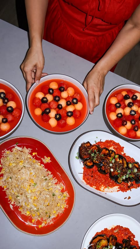 Instagram post by @bazaar_nyc for Whole Foods Market. Caption reads: I threw a tomato party for 20 people and turned my....