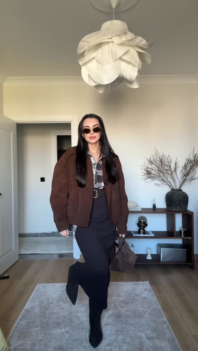 Instagram post by @busracitaak for Manu Atelier. Caption reads: Kahverengi ve süet 🤎 #reklam #outfitinspo.