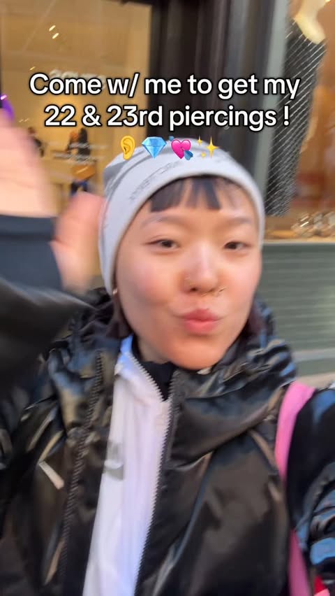 Instagram post by @ameyaokamoto for Studs. Caption reads: Two new piercings to ring in the new year 😝💘✨....