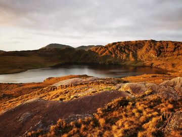 Instagram post by @lianamodonova for Tourism Ireland. Caption reads: "When I think about that sunrise that I woke up to....