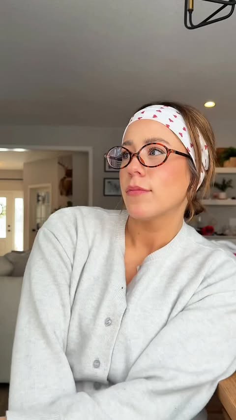 Instagram post by @alexamschweitzer for Firmoo. Caption reads: Unboxing + try-on with my latest @firmoo_optical....