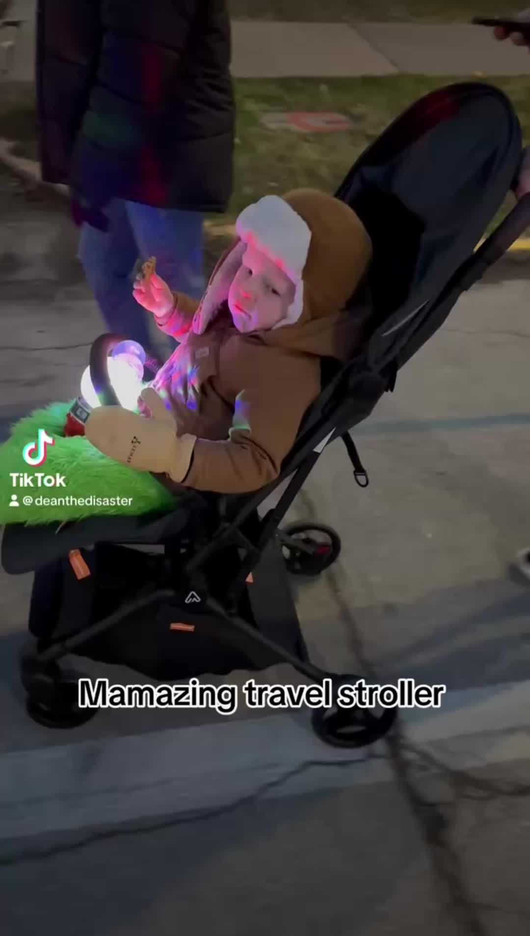 TikTok post by @deanthedisaster for Mamazing. Caption reads: @Mamazing Global #mamazing #stroller #holiday.