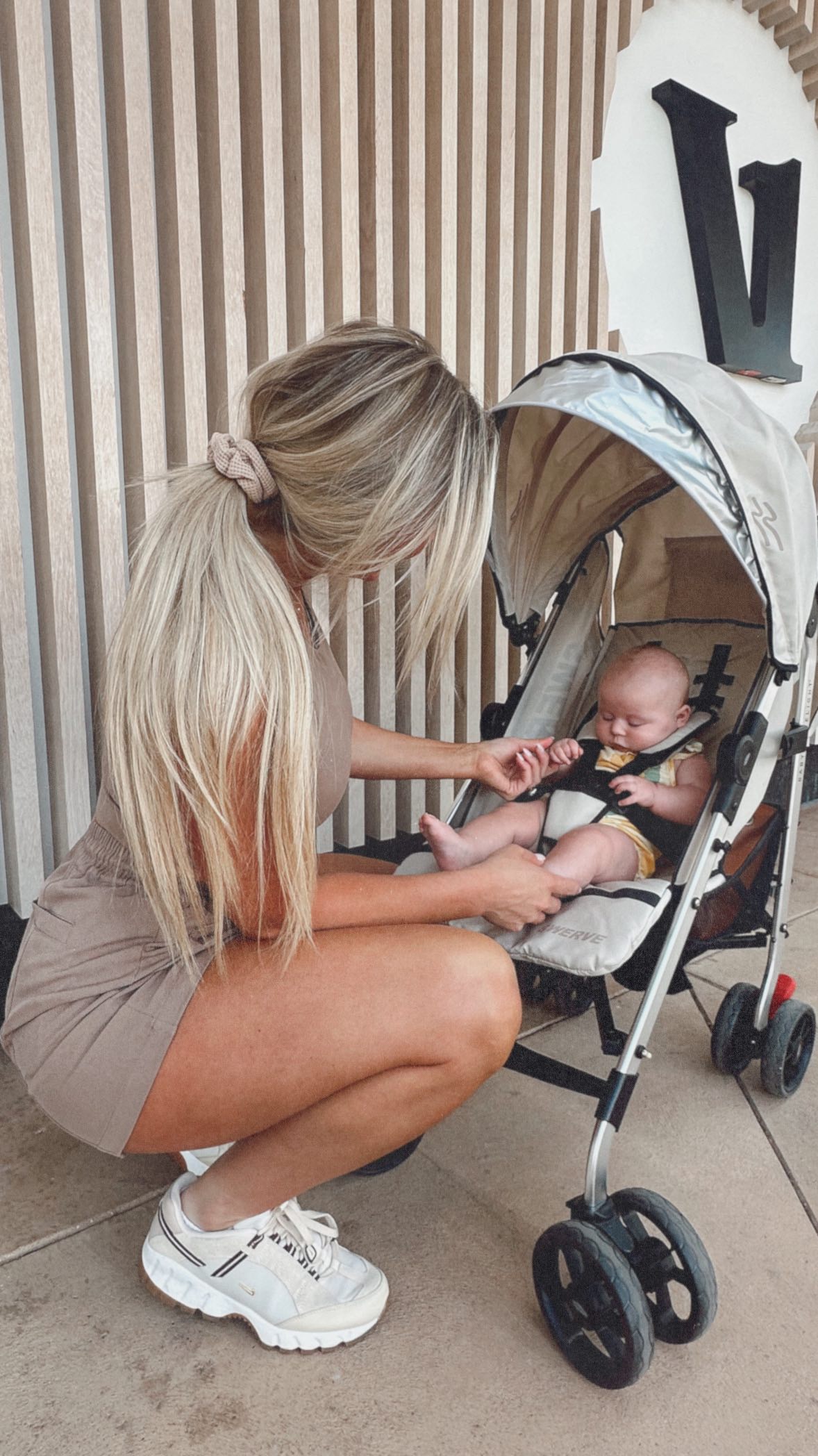 Instagram post by @taylavonne for Baby Delight. Caption reads: [...] on the go ☕️👜👟

Loving this new....