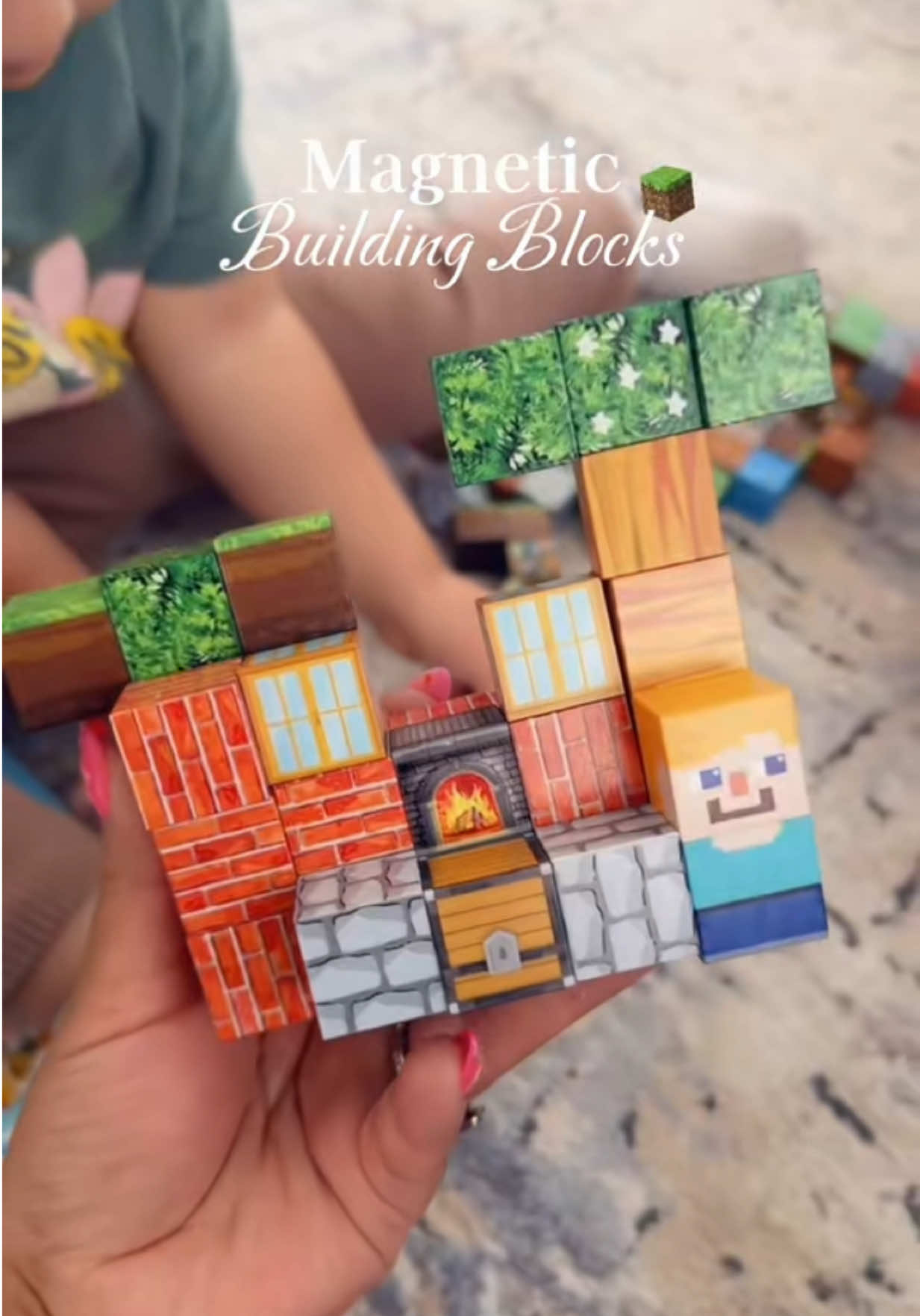 TikTok post by @stefani_laraa for Magnetopia. Caption reads: [...] #toysforkids #blocks #kidsactivities....