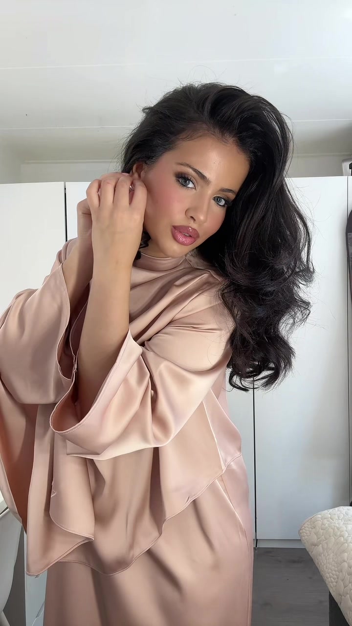 TikTok post by @sihamsanad_ for Merrachi. Caption reads: Found my @MERRACHI eid dress🤭🎀✨ ad.