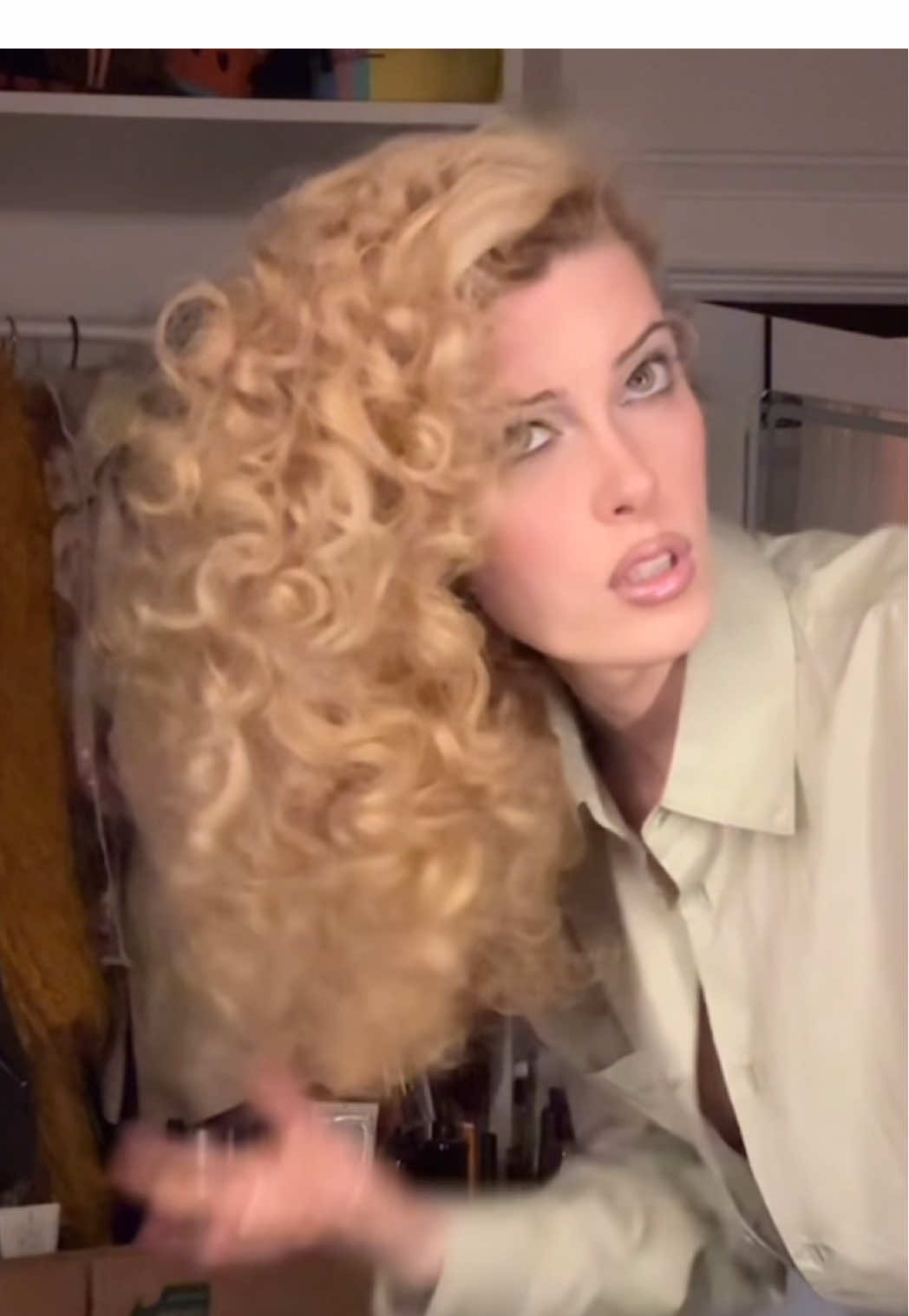 TikTok post by @thegigigoode for Acne Studios. Caption reads: POV it’s 1984 and I’m getting ready for my office....