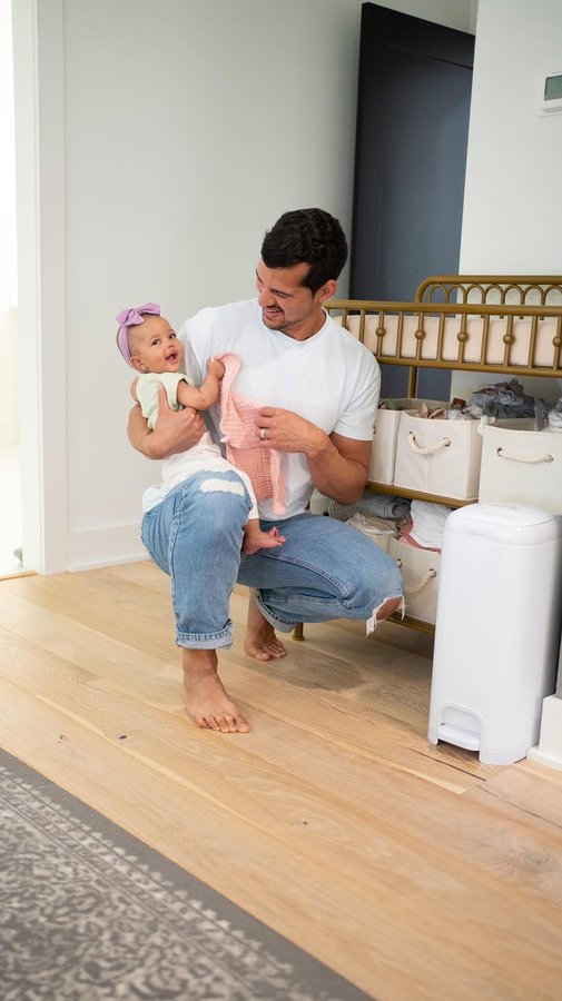 Instagram post by @thecurlycoopers for Diaper Genie. Caption reads: #DiaperGeniePartner Who doesn’t love a good [...].