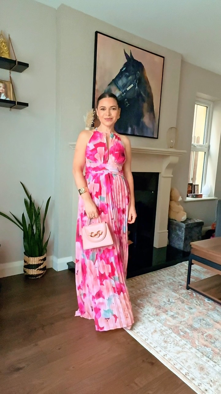 Instagram post by @stylebyfabiobrien for LightInTheBox. Caption reads: When the dress does all the talking 💐✨ Flowy,....