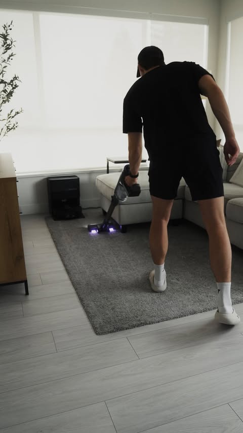 Instagram post by @danemcbeth for Shark Clean. Caption reads: #ad Satisfying living room reset with help from....
