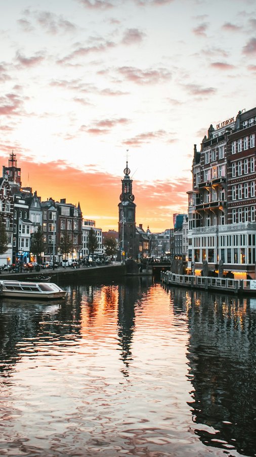 Instagram post by @nextdepartureca for Air Transat. Caption reads: Toronto to Amsterdam for only $488 roundtrip taxes....