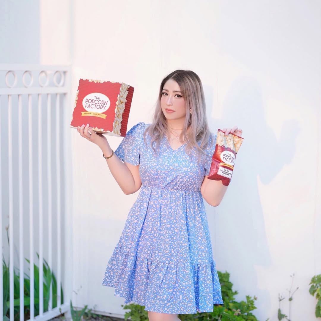 Instagram post by @icythaitea for The Popcorn Factory. Caption reads: Who else loves popcorn?! 🍿 And even more flavored....