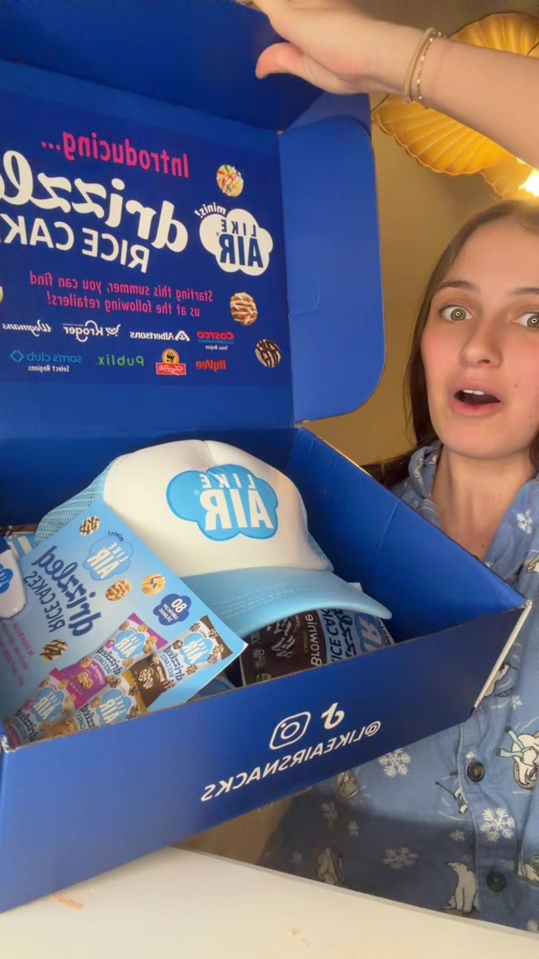 TikTok post by @elle.russell for Like Air Puffcorn. Caption reads: [...] showed up today 🤍✨ Thank you @Like Air....
