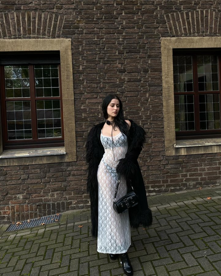 Instagram post by @melancholybty for Emmiol. Caption reads: Dress from @emmiolofficial Use my discount code:....