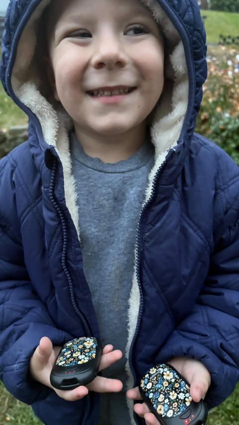 Instagram post by @two__boys__me for Ocoopa. Caption reads: [...] walks… 

until we found these! ❄️🐾

The....