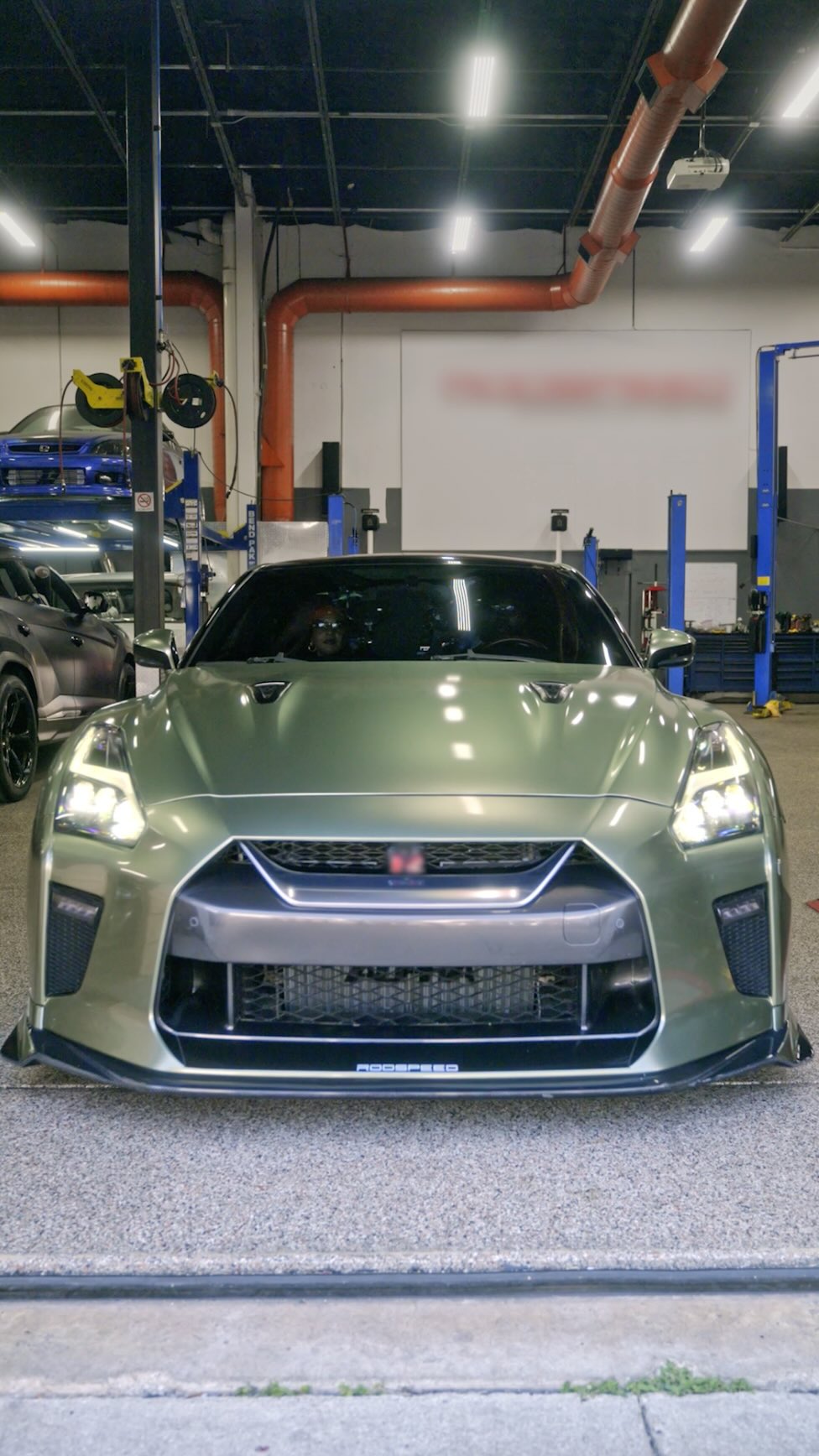 Instagram post by @hertlife for eBay Motors. Caption reads: It’s 🔧 time! Jump into the garage with @hertlife....