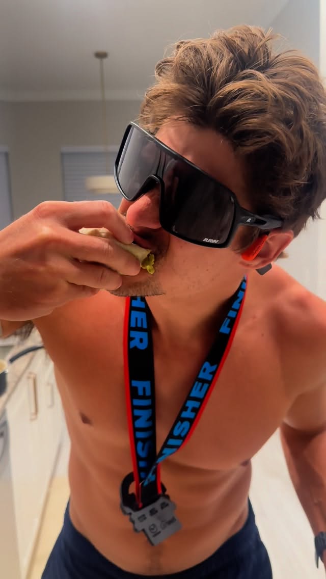 Instagram post by @zachrancey for Green Chef. Caption reads: Yes, that’s an Ironman Finisher Medal 🏅....