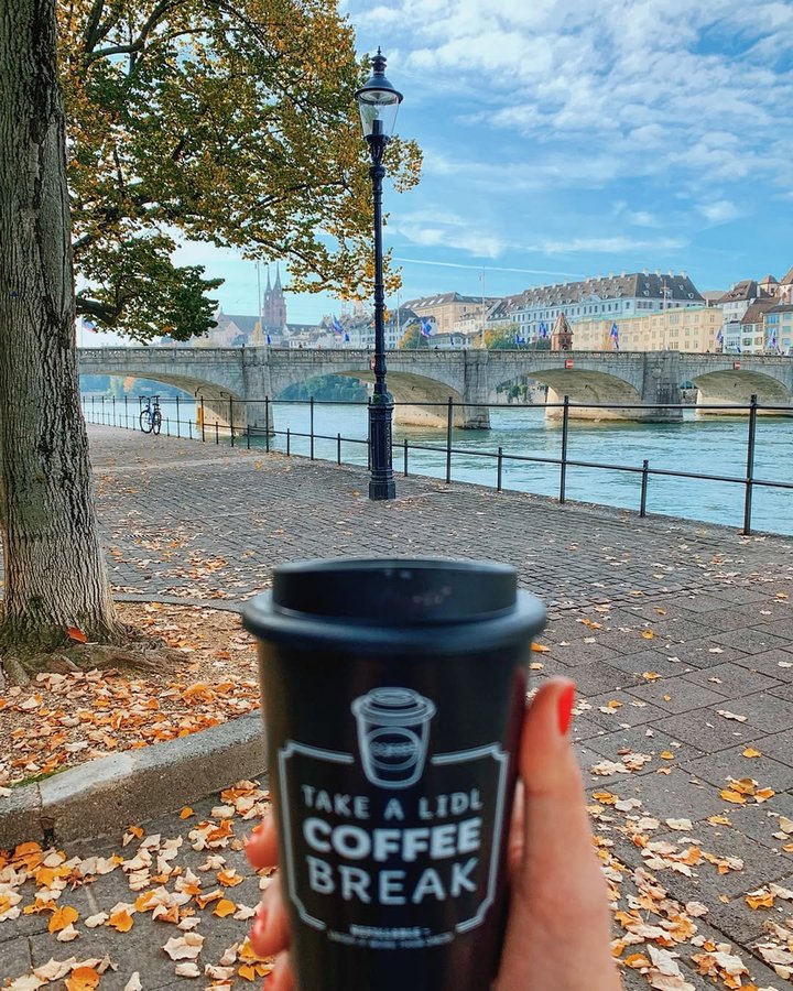 Instagram post by @girlinbasel for lidlch. Caption reads: Took a Lidl coffee break today 🥰 When I have free....