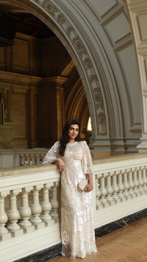 Instagram post by @shegina_goder for Needle & Thread. Caption reads: The kind of dress every occasion waits for ✨....