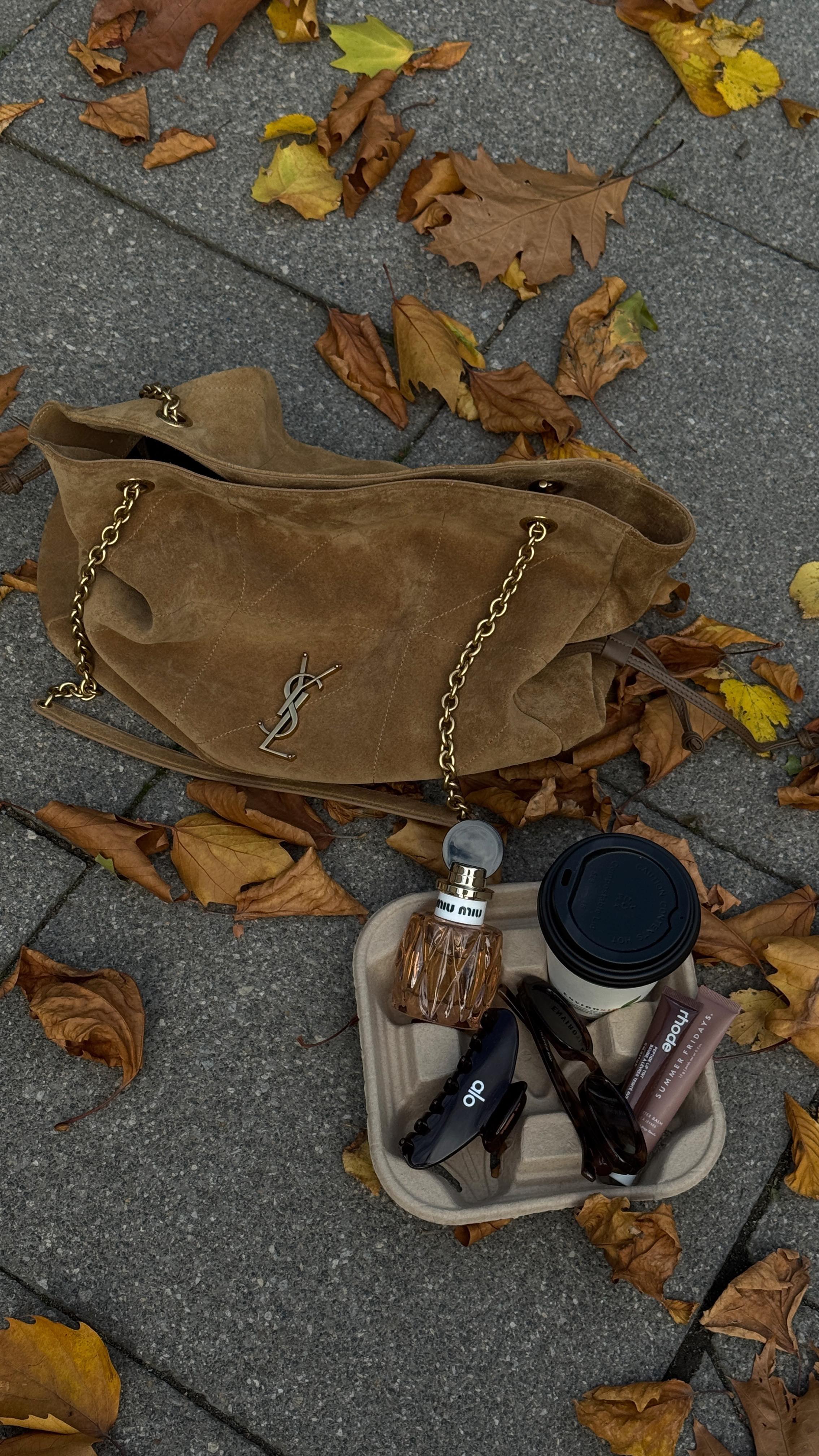 Instagram post by @bethanmccoy for Missguided. Caption reads: newsflash i actually love autumn 🥨👢☕️🧸....