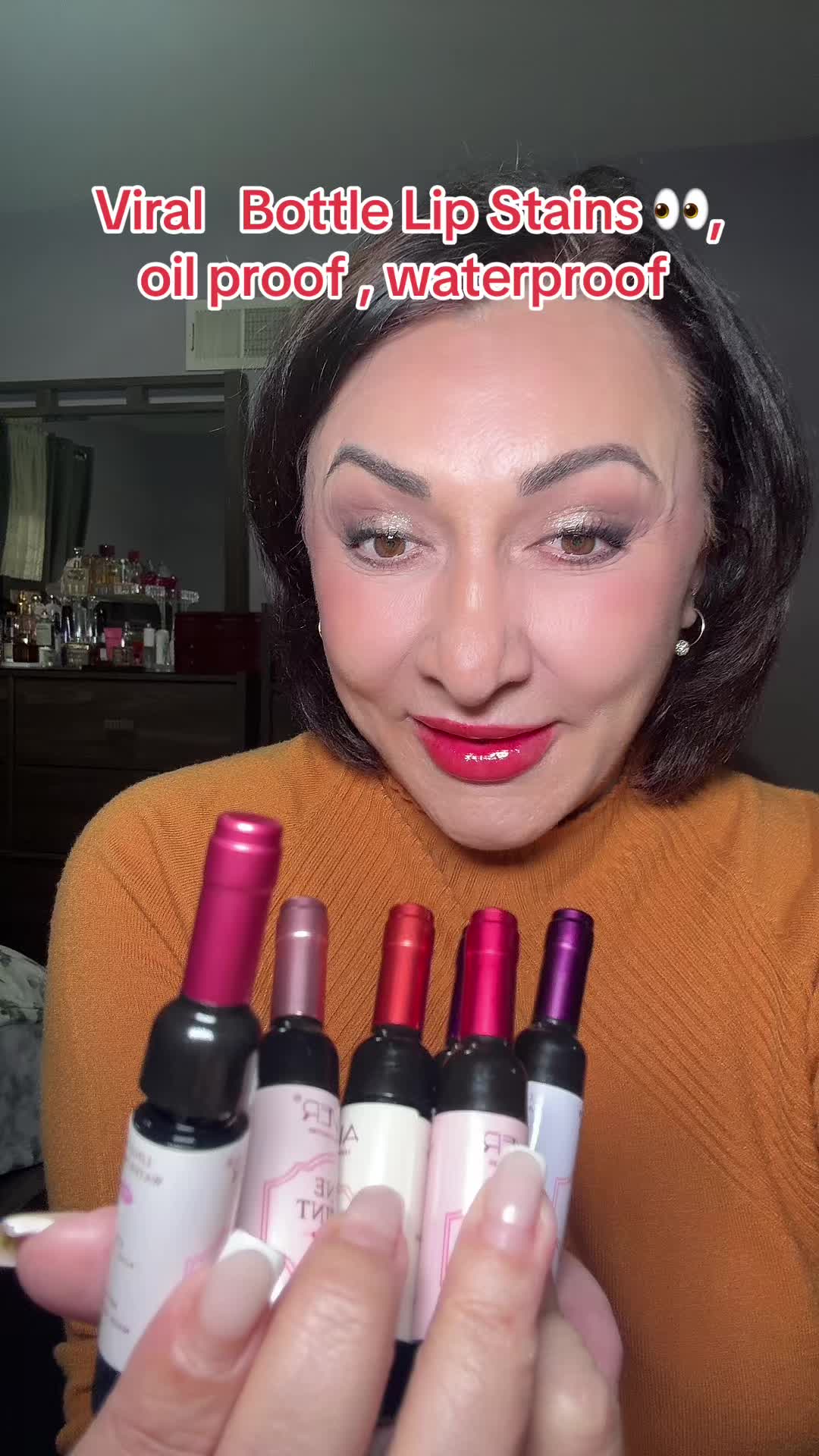TikTok post by @olyala319 for Aliver. Caption reads: Trying the viral ALIVER bottle lip stain set— 6....