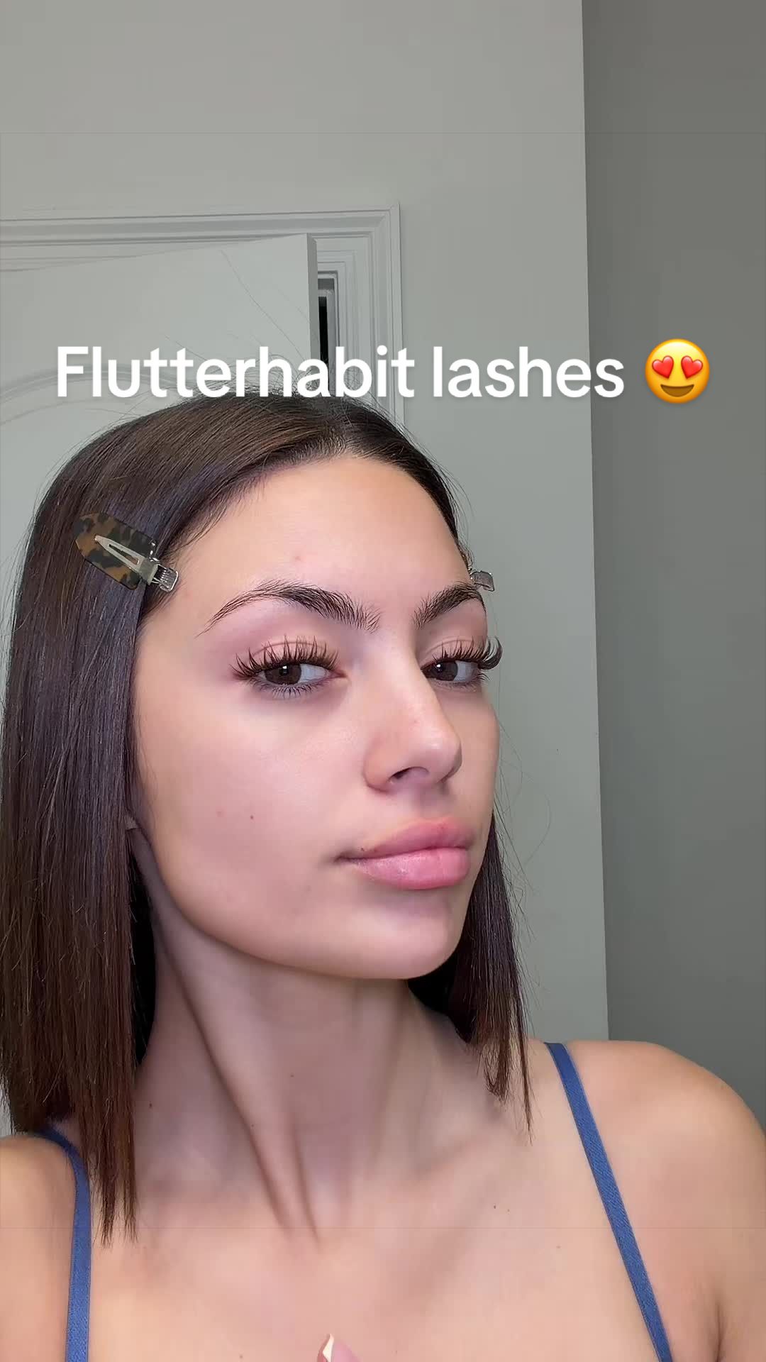 TikTok post by @schaferkaitlin for FlutterHabit. Caption reads: New lashes by @flutterhabit in the style ‘The....