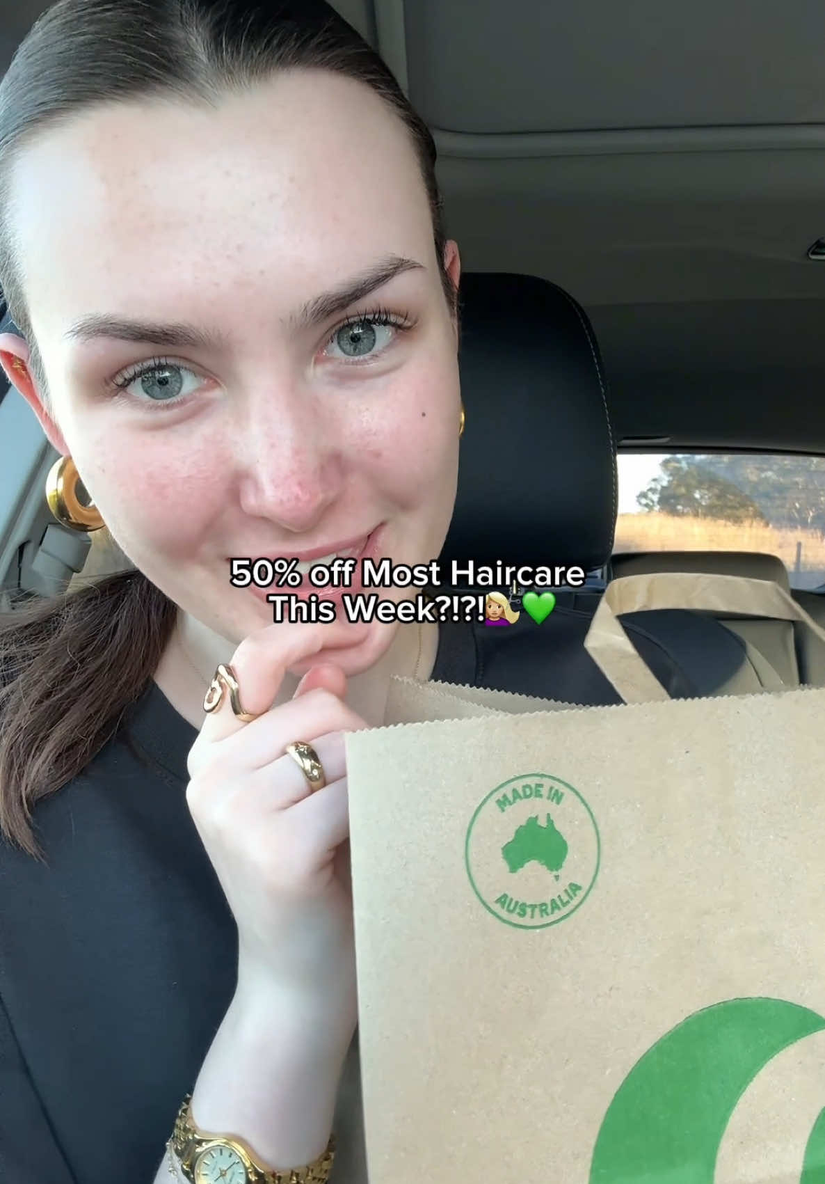 TikTok post by @lucywwilson for Woolworths. Caption reads: Just popped in for snacks… left with a new hair....