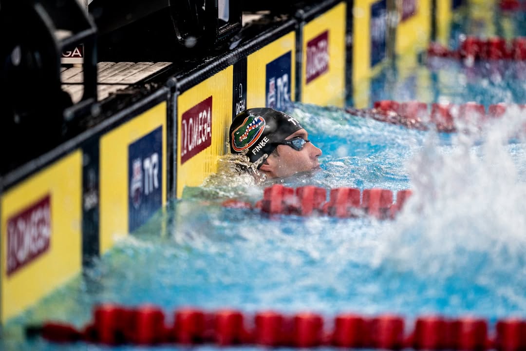 Instagram post by @robert_finke for TYR Sport. Caption reads: [...] Hey guys! I’m partnering with @tyrsport to....