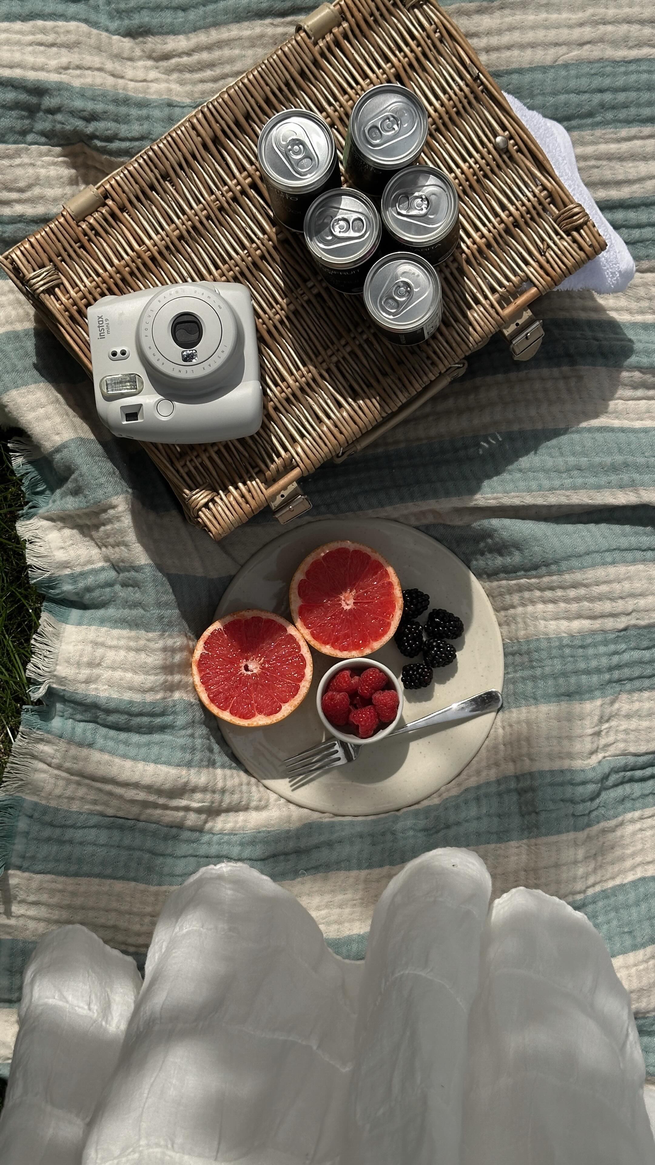 Instagram post by @hollyrebeccawhite for MOTH Drinks. Caption reads: AD | @mothdrinks are your summer in a can, crafted....