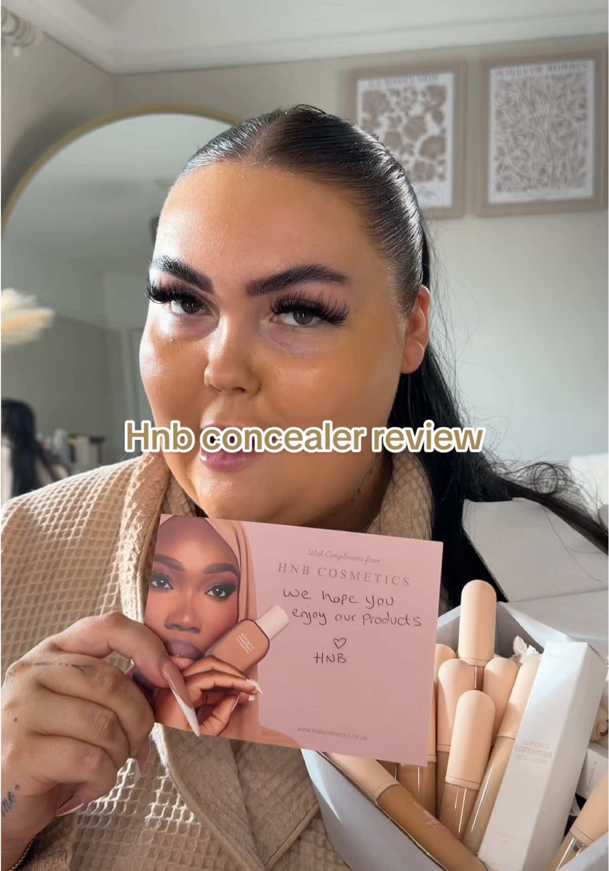 TikTok post by @lucyfice for HNB Cosmetics. Caption reads: HNB concealer newness… let’s review💅 @HNB....