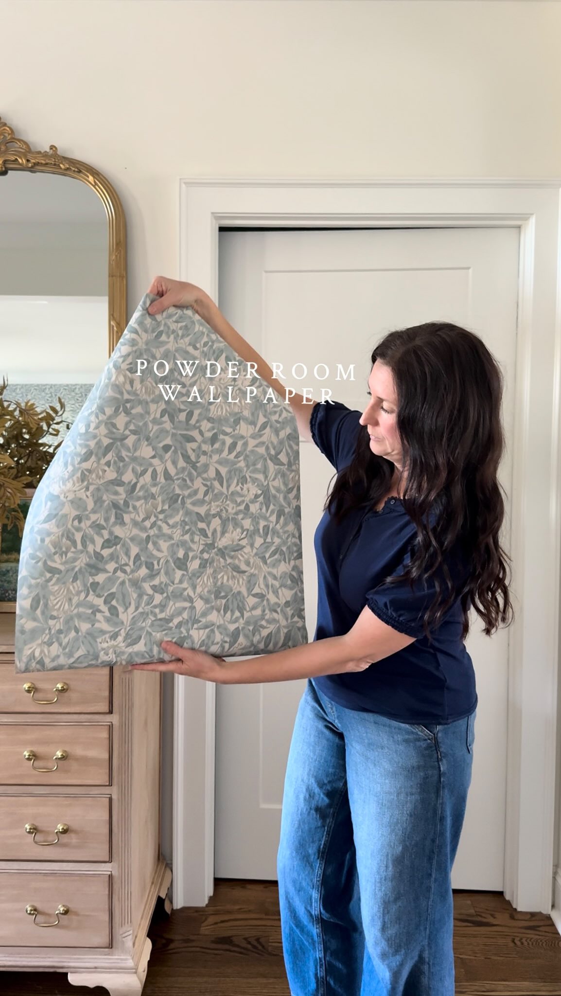 Instagram post by @amelialawrencehome for Sandberg Wallpaper. Caption reads: Loving this wallpaper for the powder room! 

Have....