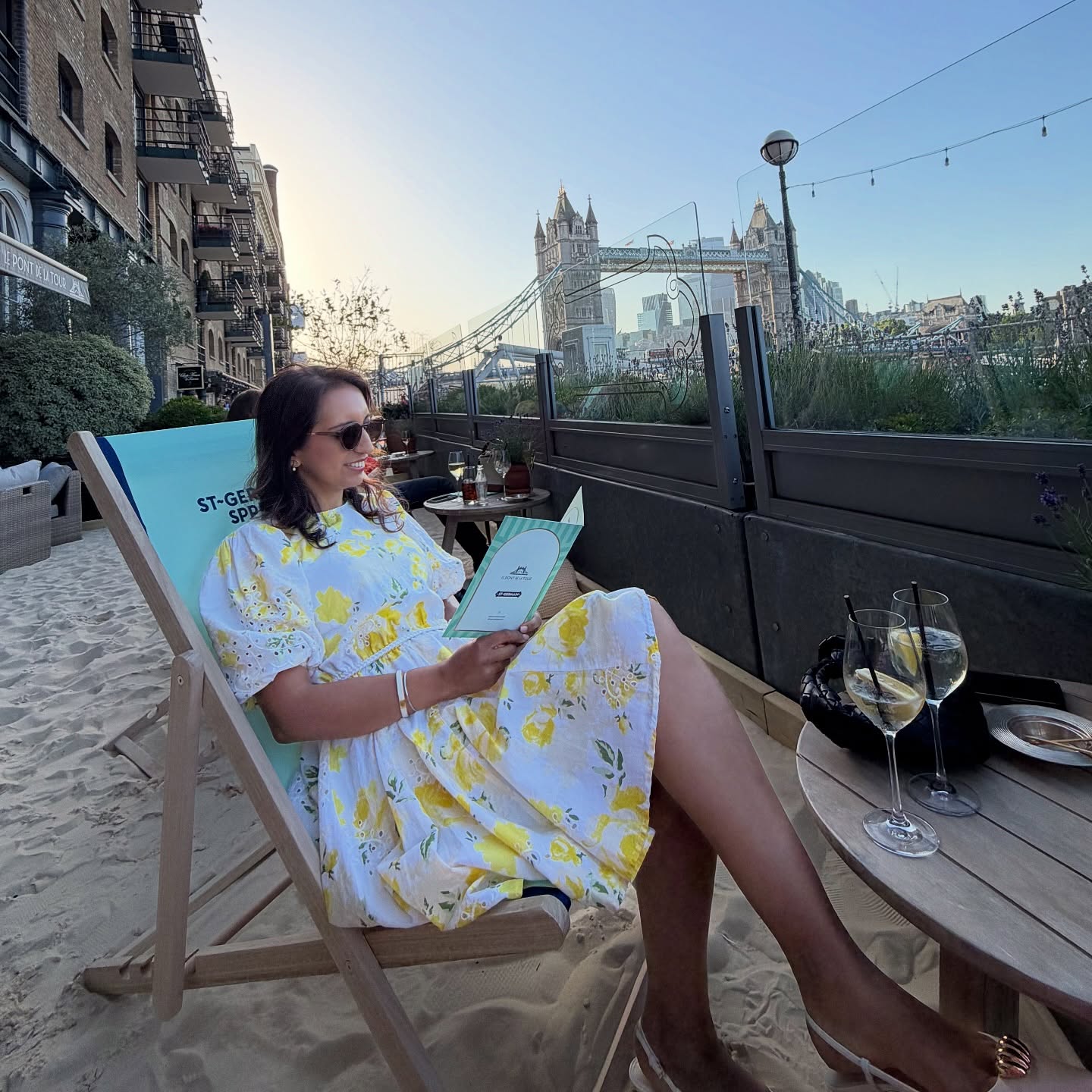 Instagram post by @london.travel.life for London | Explore. Caption reads: Summer evenings at @lepontdelatourldn 🇫🇷🍸 If....