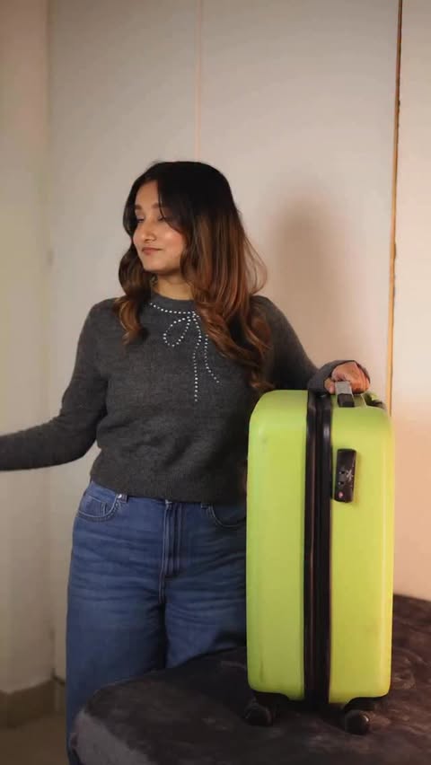 Instagram post by @theinformalfreak for Aqualens. Caption reads: ✈️ TRAVEL BAG DUMP — the REAL mvps 
Everything....