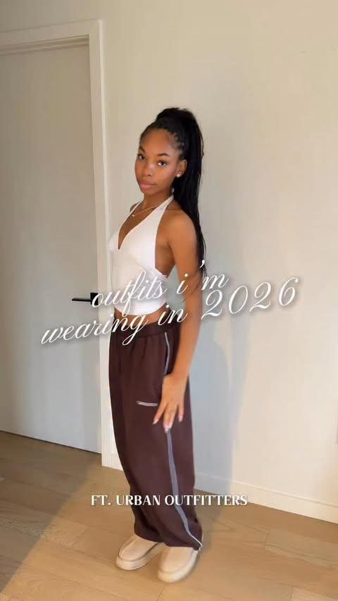 Instagram post by @officiallydaitime for Urban Outfitters. Caption reads: 2025 & hello 2026 with @urbanoutfitters 🩷☁️ shop....