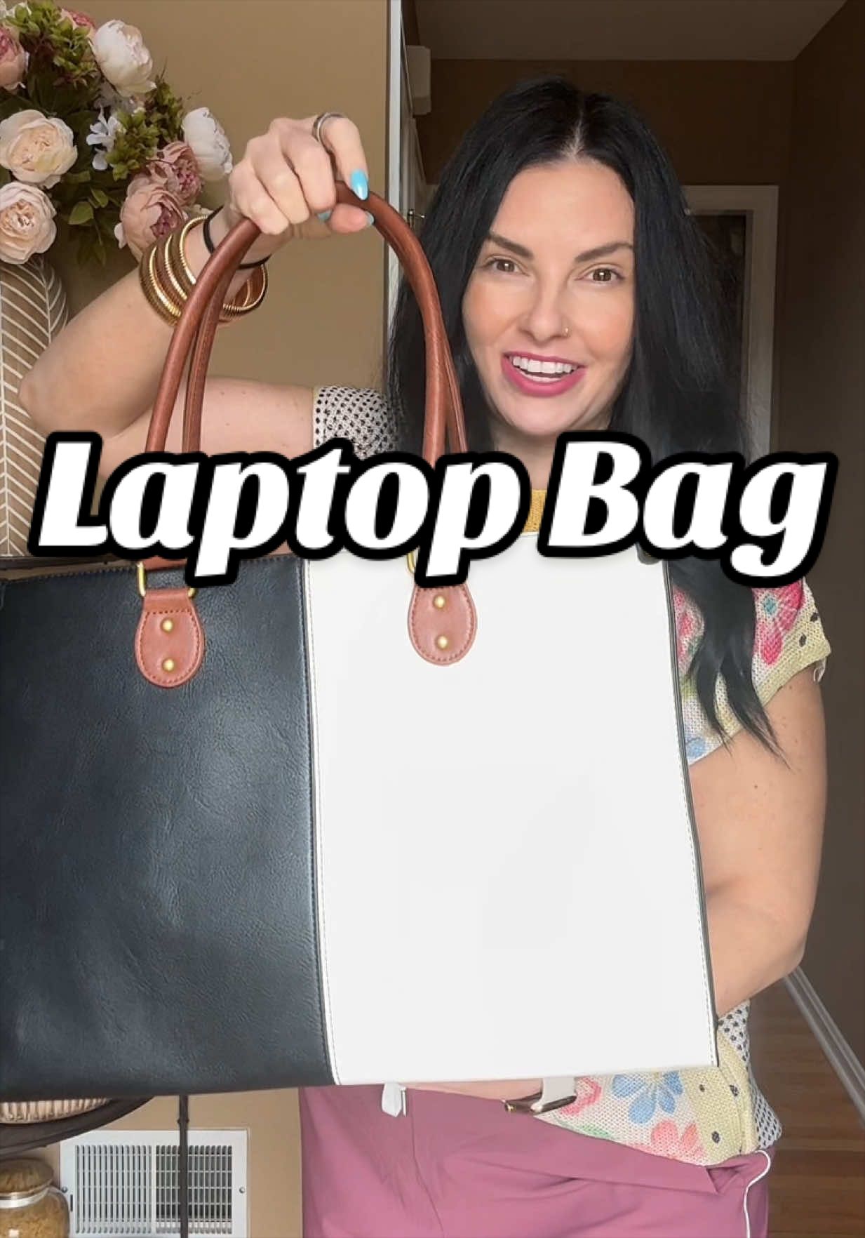 TikTok post by @hollyamberw for Lovevook. Caption reads: #laptopbag #lovevook #carryall #largetote....