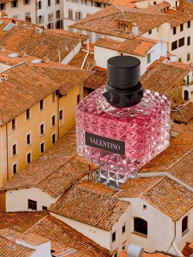 Instagram post by @the.daily.splice for Valentino Beauty. Caption reads: @the.daily.splice reimagines Born in Roma through....