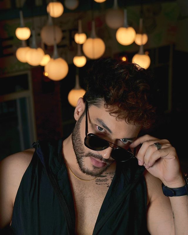 Instagram post by @shaneerbassiofficial for Fugazee. Caption reads: [...] crushed nylon sleeveless windbreaker by....