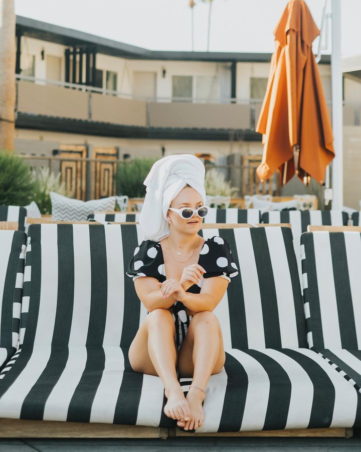 Instagram post by @averyyrodgers for Bryan Anthonys. Caption reads: poolside polka dots👙 @bryananthonys not only has....