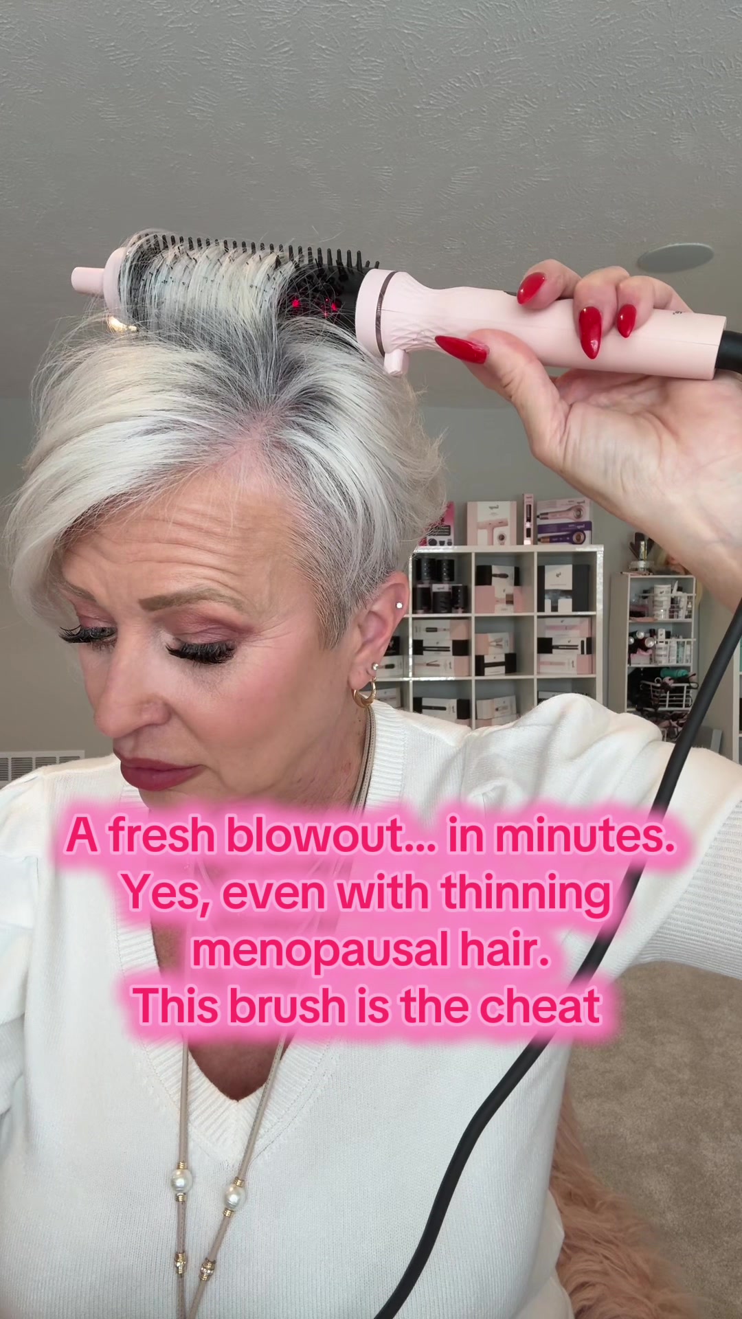 TikTok post by @theplatinumsass for L’ange Hair. Caption reads: [...] #HealthyHairOver50 @langehair.