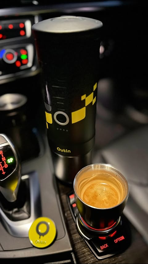 Instagram post by @brewcoffeehome for OutIn. Caption reads: [...] my car into a tiny espresso bar today.....