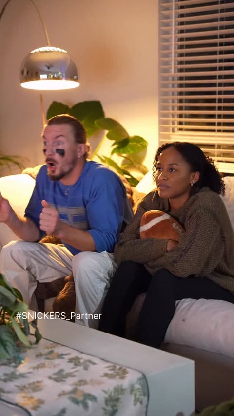 Instagram post by @jamesandcaleigha for Snickers. Caption reads: #SNICKERS_Partner I may not understand every [...].