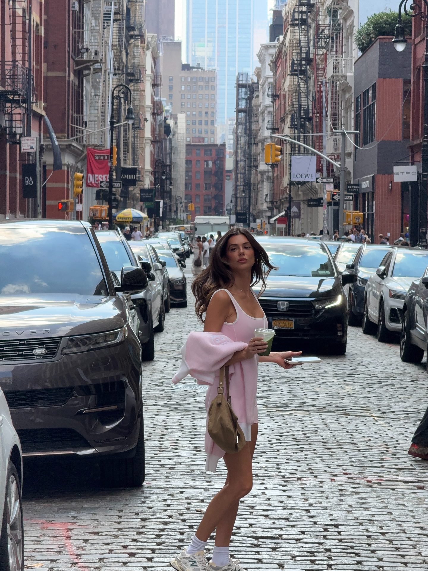 Instagram post by @ashtonwood for boandtee. Caption reads: running around the big apple 🍎🗽.