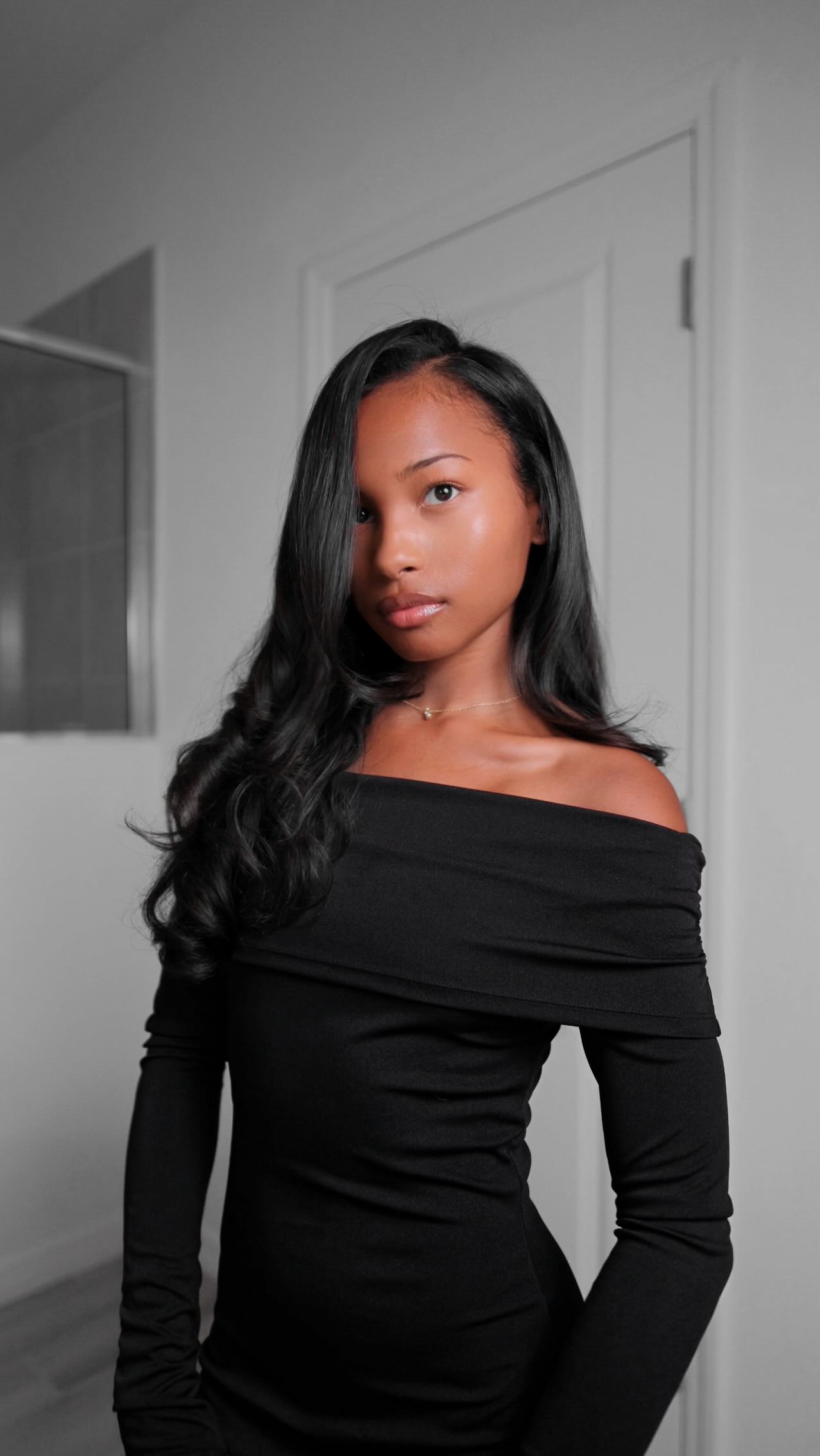 Instagram post by @lizaotovo for Aveda. Caption reads: [...] love with this bouncy holiday hair using....