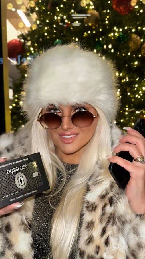 Instagram post by @juliareno_official for AquaVault. Caption reads: 📳 Chargecard is calling - answer!  @aquavault No....