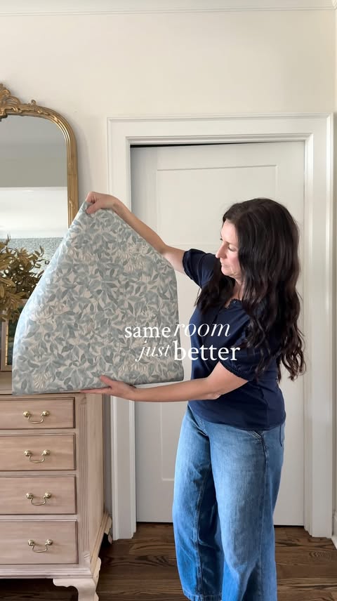 Instagram post by @amelialawrencehome for Sandberg Wallpaper. Caption reads: A little trim, fresh paint, new vanity, gorgeous....