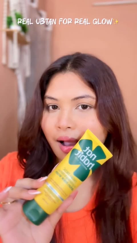Instagram post by @__aradhyapaul__ for Nat Habit®. Caption reads: Glow naturally with every wash ✨ Nat Habit Ubtan....