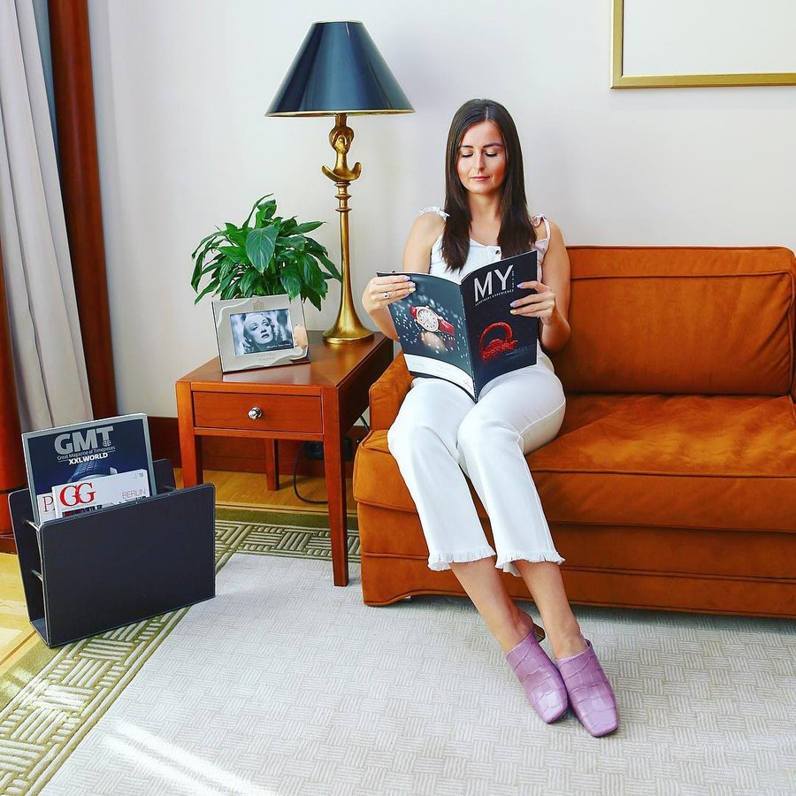 Instagram post by @enikotothblog for Nanushka. Caption reads: Expand your mind 📰 #adlon #hoteladlon....