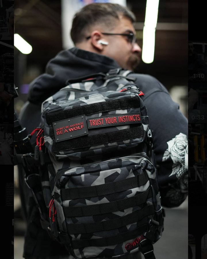 Instagram post by @inthegym.zeus for WOLFpak. Caption reads: Excited to announce my partnership with WolfPak!....